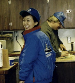 Fishermen's Finest CEO Helena Park, aboard the American No. 1, in the late 1980s, checks in on the cook of her crew.